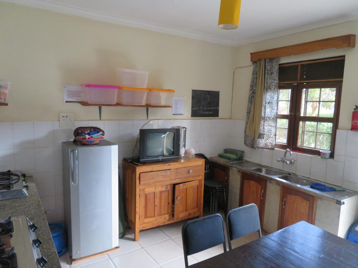Отель Bikeventures House Uganda Джинджа Экстерьер фото